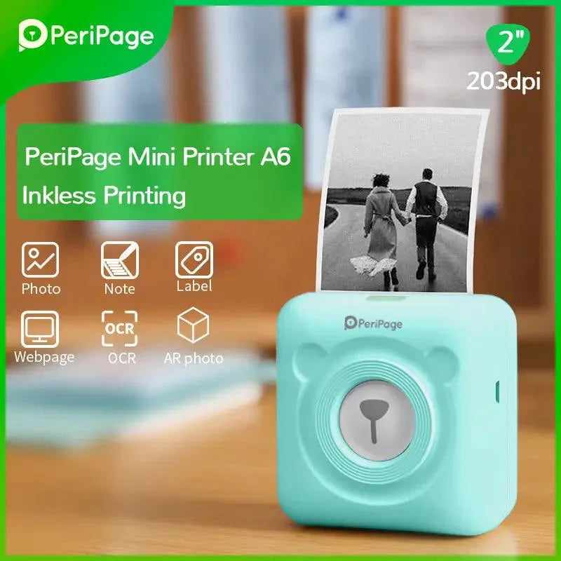 PeriPage 2" A6 Mini Printer in blue, showing photo printing functionality with a photo of a couple, 203dpi resolution.