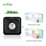 PeriPage A6 Mini Bluetooth Portable Thermal Printer in black, 304dpi resolution, shown with 3 rolls of thermal paper and 3 rolls of colored thermal paper. Compact bear-shaped mini printer for printing notes, photos, and lists.